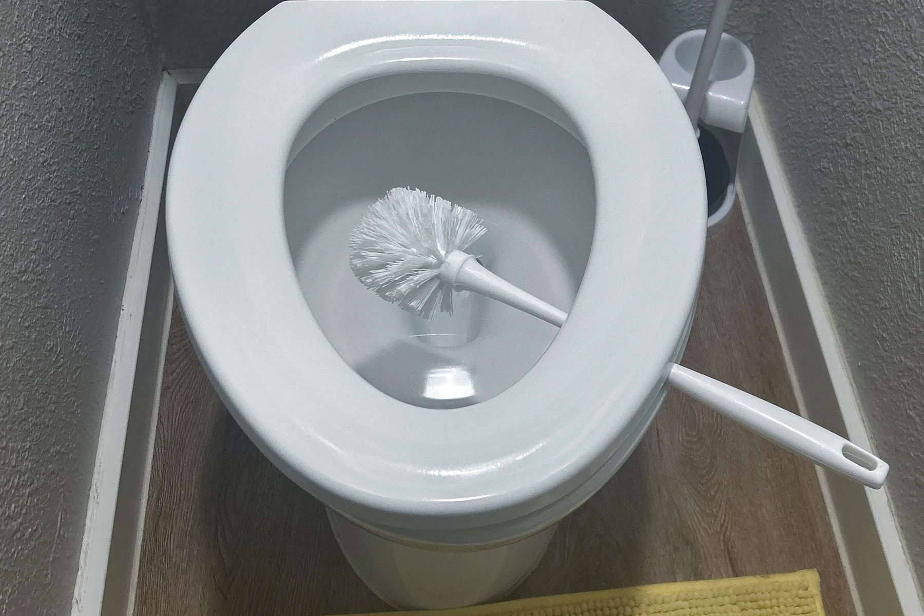 Drying Toilet Brush Under Seat to Prevent Bacteria & Slime Buildup